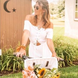 I want this style in black or white size MBlue Blush NWT!! White lace up romper